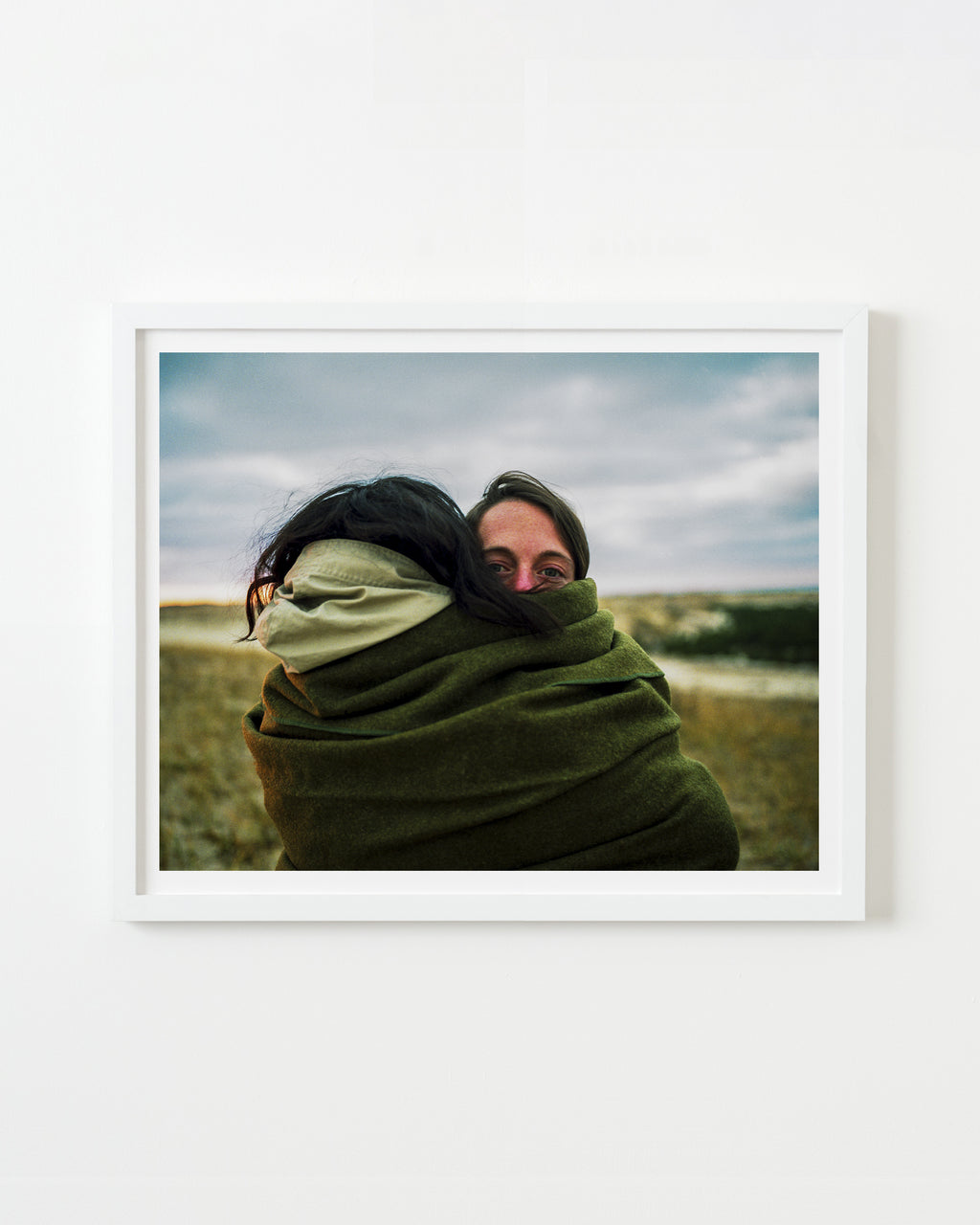 Photography by Nick Meyer titled "Alexis and Lydia Hugging" - 1.