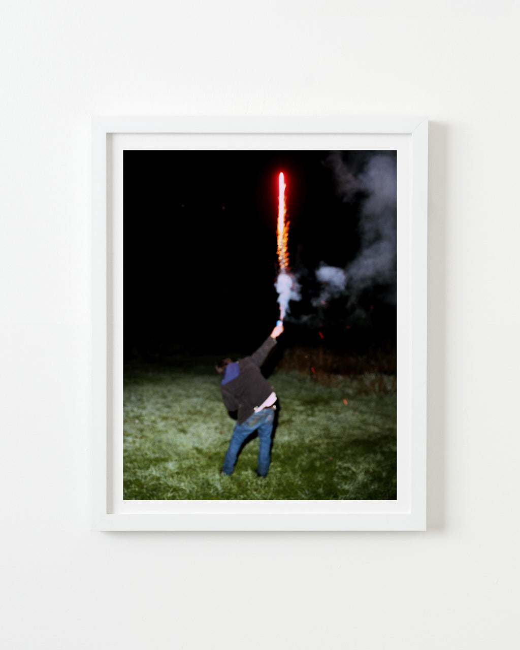 Photography by Nick Meyer titled "Manny Holding a Firework" - 1.