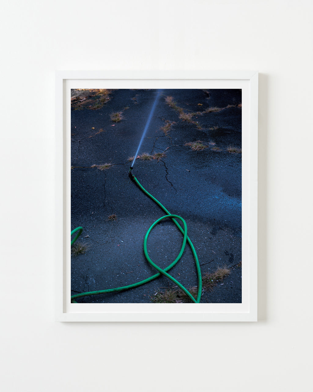 Photography by Nick Meyer titled "Running Hose" - 1.