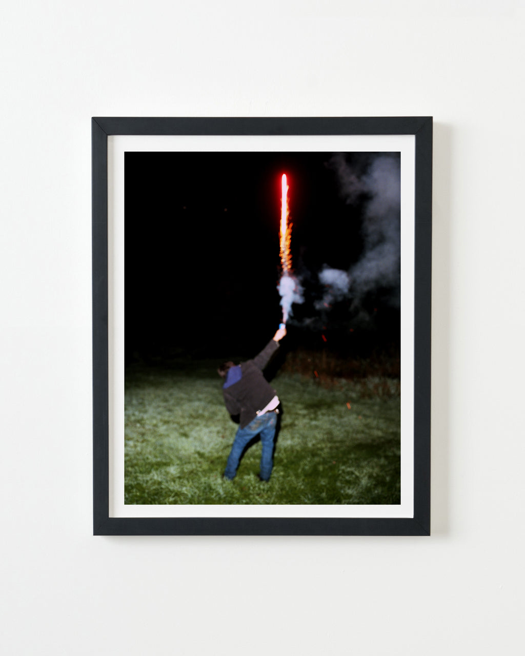 Photography by Nick Meyer titled "Manny Holding a Firework" - 3.