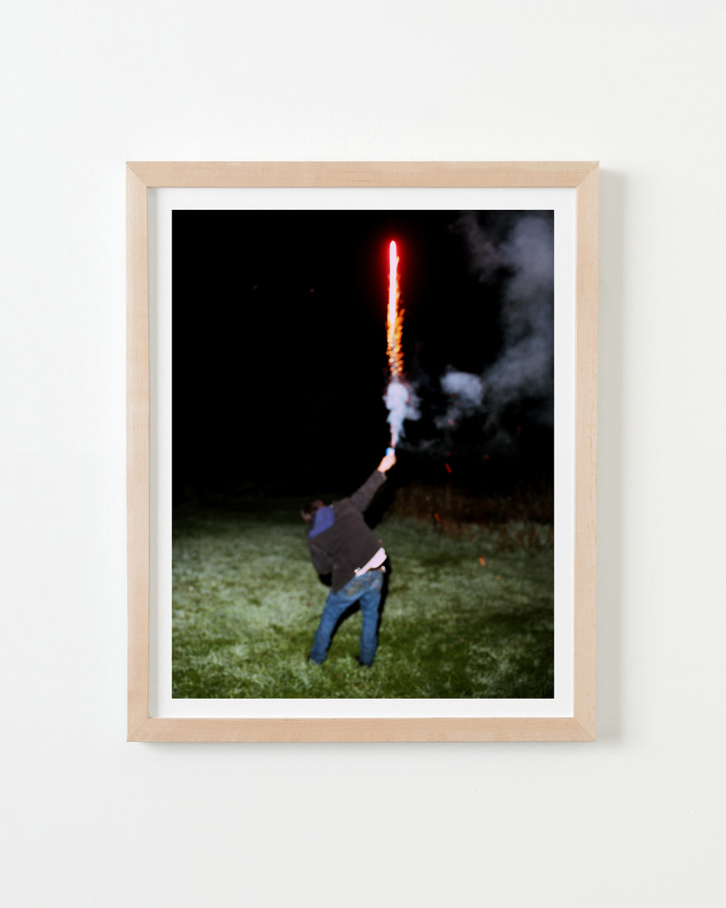 Photography by Nick Meyer titled "Manny Holding a Firework" - 4.