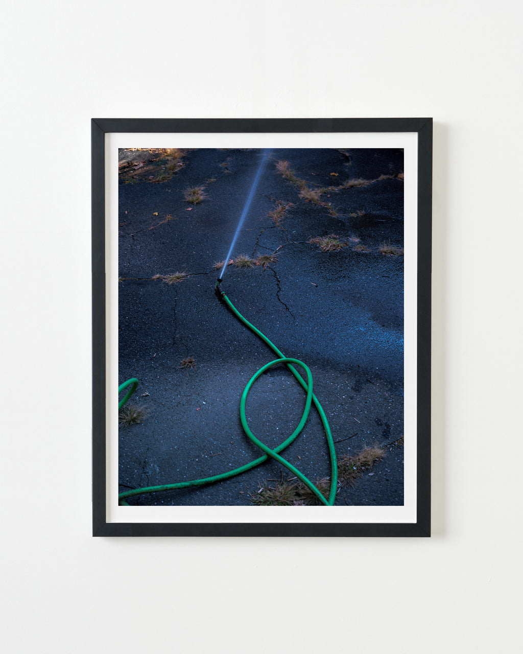 Photography by Nick Meyer titled "Running Hose" - 3.